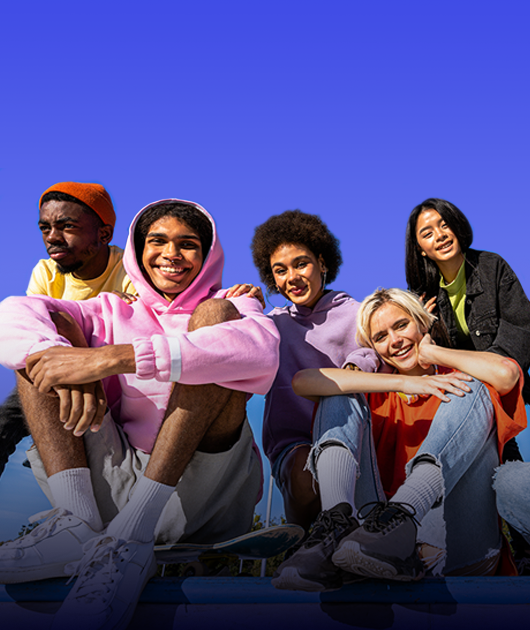 Image of young creative people in colourful clothing